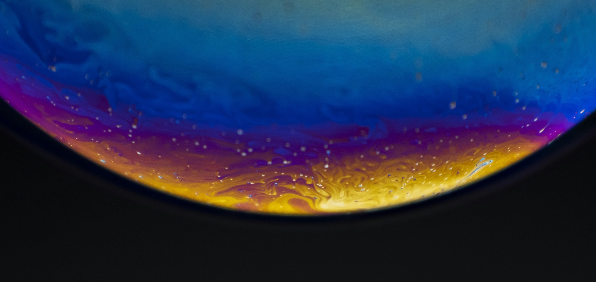 colorful bubble with dark background